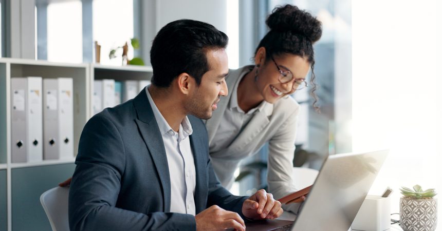 2578200 business people strategizing with a laptop in an office setting 1c04a2939f