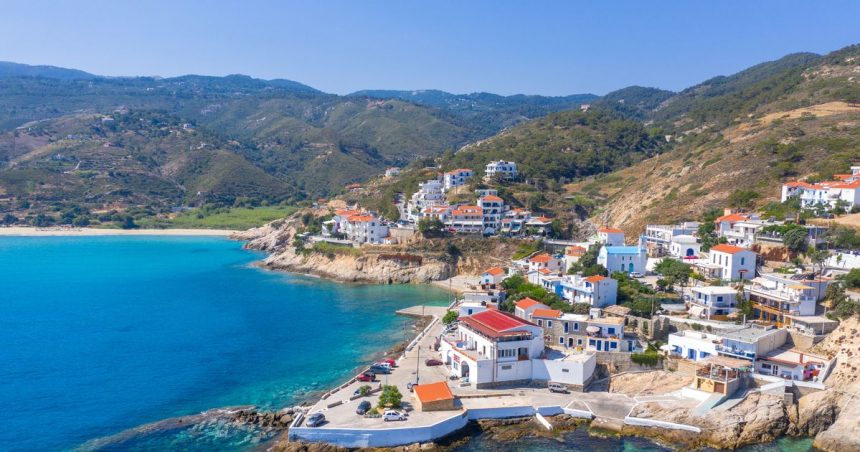 1 Picturesque small village of Armenistis with amazing sandy beach Mesakti in Ikaria island Greece.j