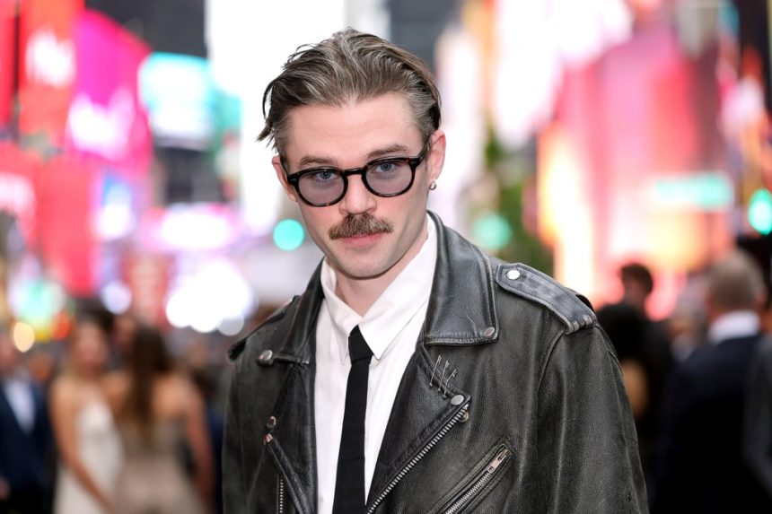 dom dolla f1 premiere 2025 billboard 1800