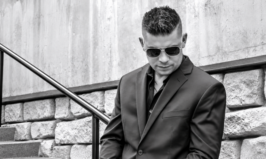 Cool Toned Man by Stairway Rail 1000x600