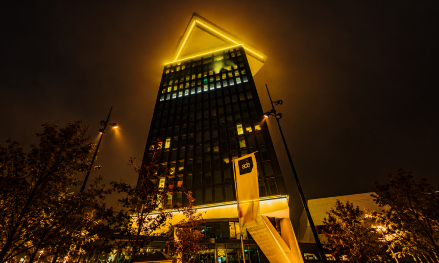 Golden Triangle Tower at Night 1000x600