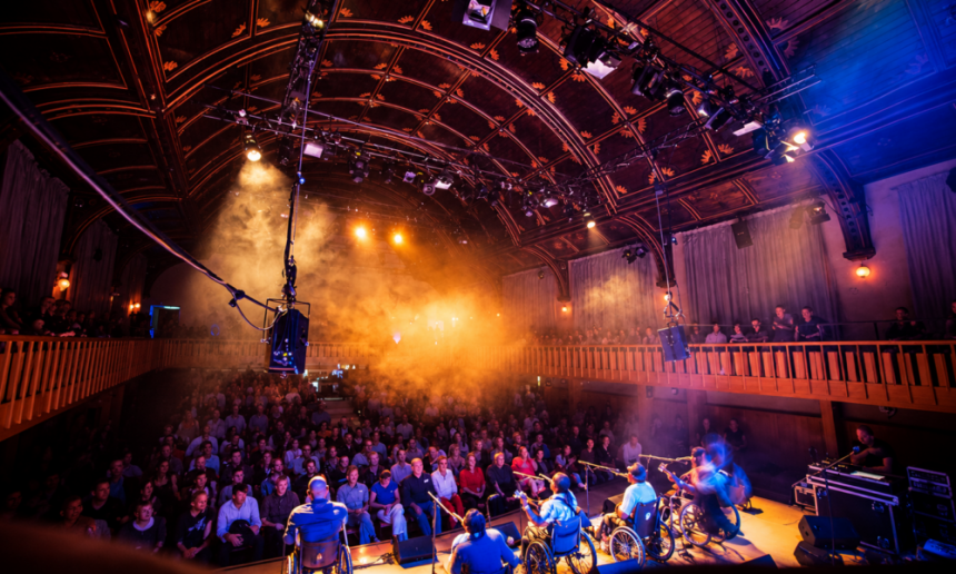Ornate Hall Concert Under Amber Lights 1000x600